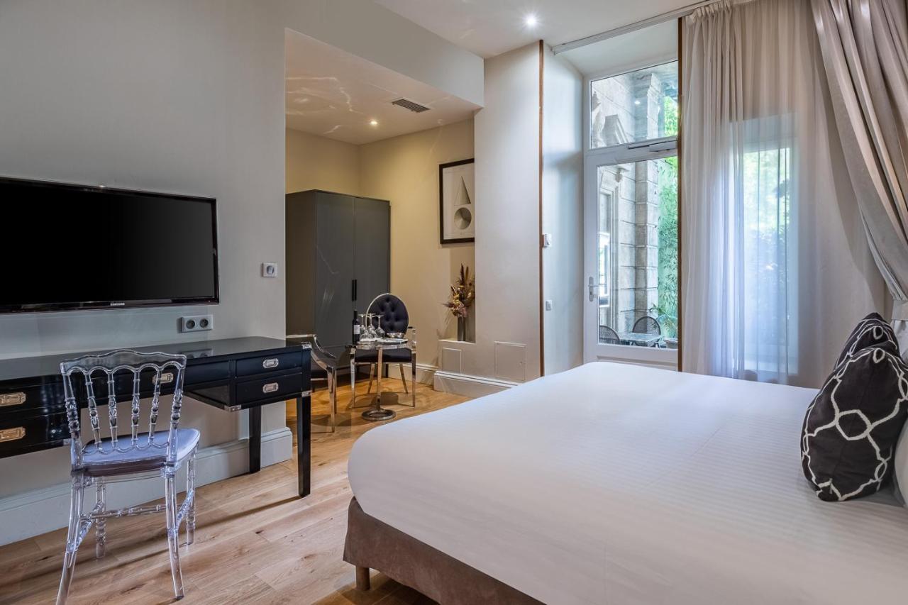 Le Boutique Hotel&Spa Bordeaux Extérieur photo A room at the hotel