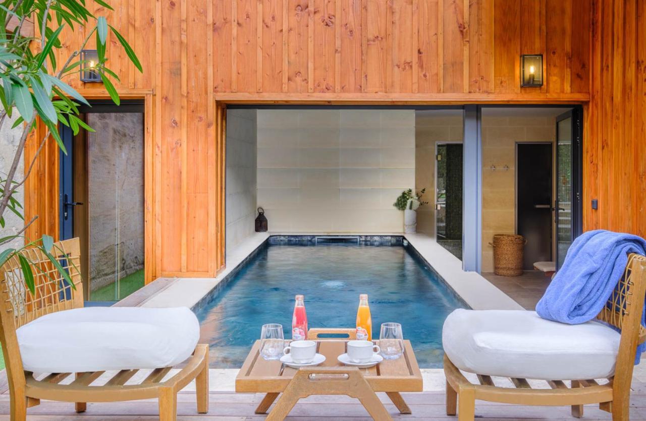 Le Boutique Hotel&Spa Bordeaux Extérieur photo The swimming pool at the hotel