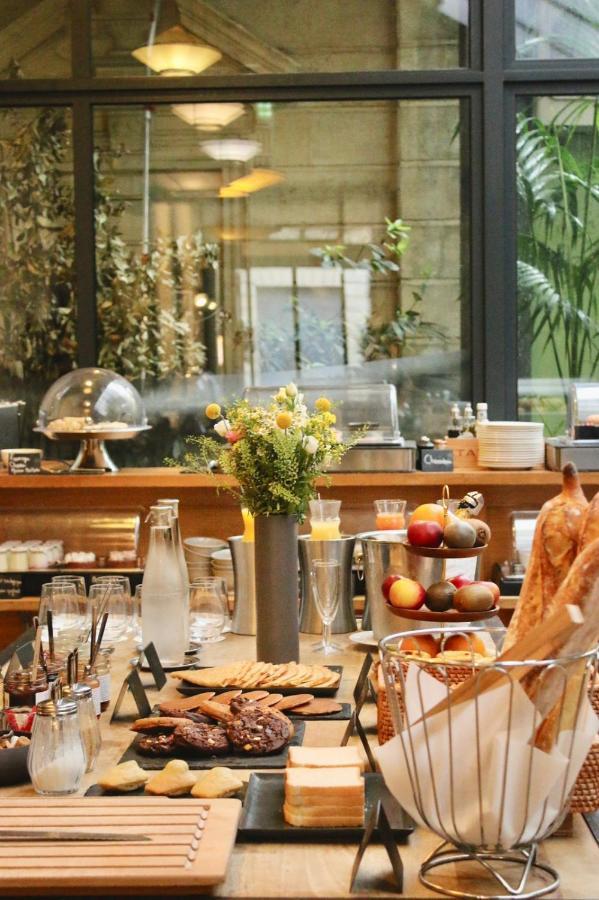 Le Boutique Hotel&Spa Bordeaux Extérieur photo A buffet at a hotel