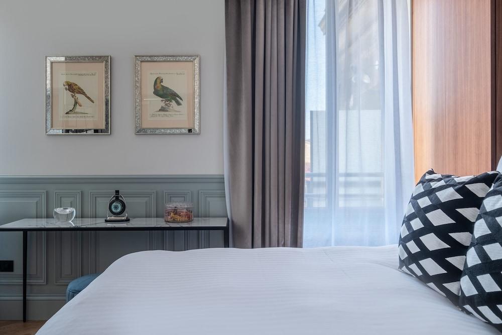 Le Boutique Hotel&Spa Bordeaux Extérieur photo A bedroom at the hotel