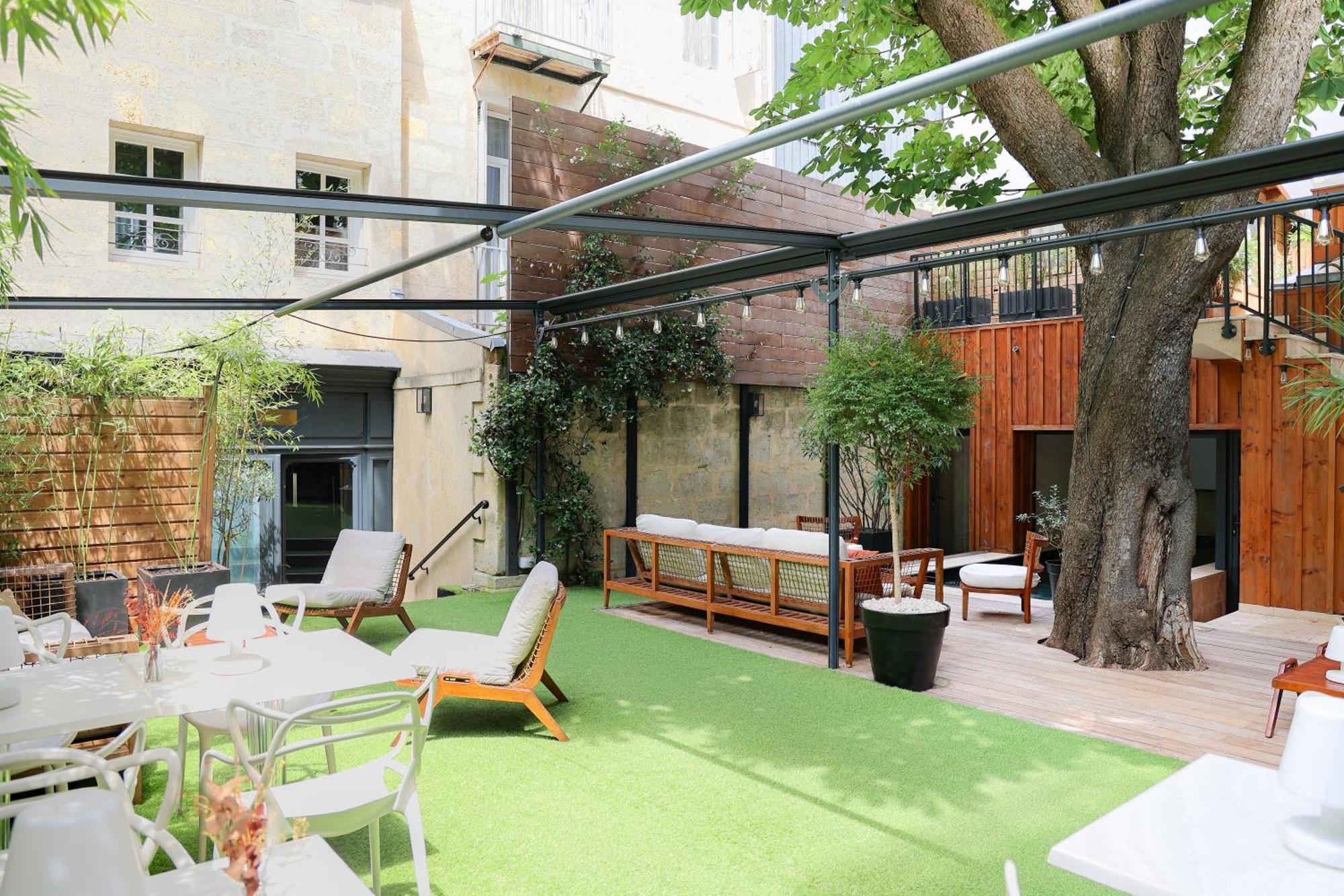 Le Boutique Hotel&Spa Bordeaux Extérieur photo The garden at the hotel